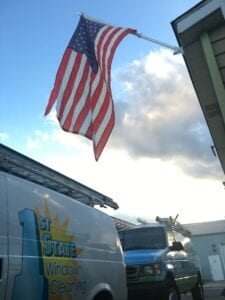 An American Flag Outside a House